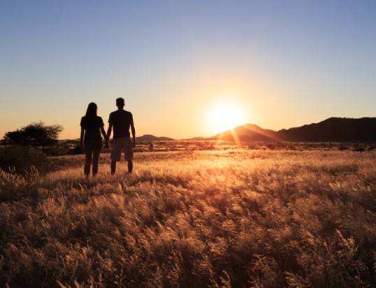 People holding hands in nature